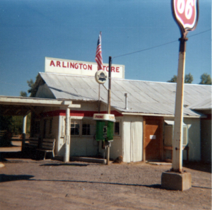 Arlington Store and gas station advertising a telephone and containing a post office
