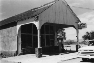 Bonita post office exterior with "Coors Beer" sign