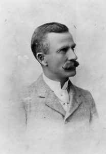 Stanley C. Bagg and his mustache, postmaster of Cyclopic